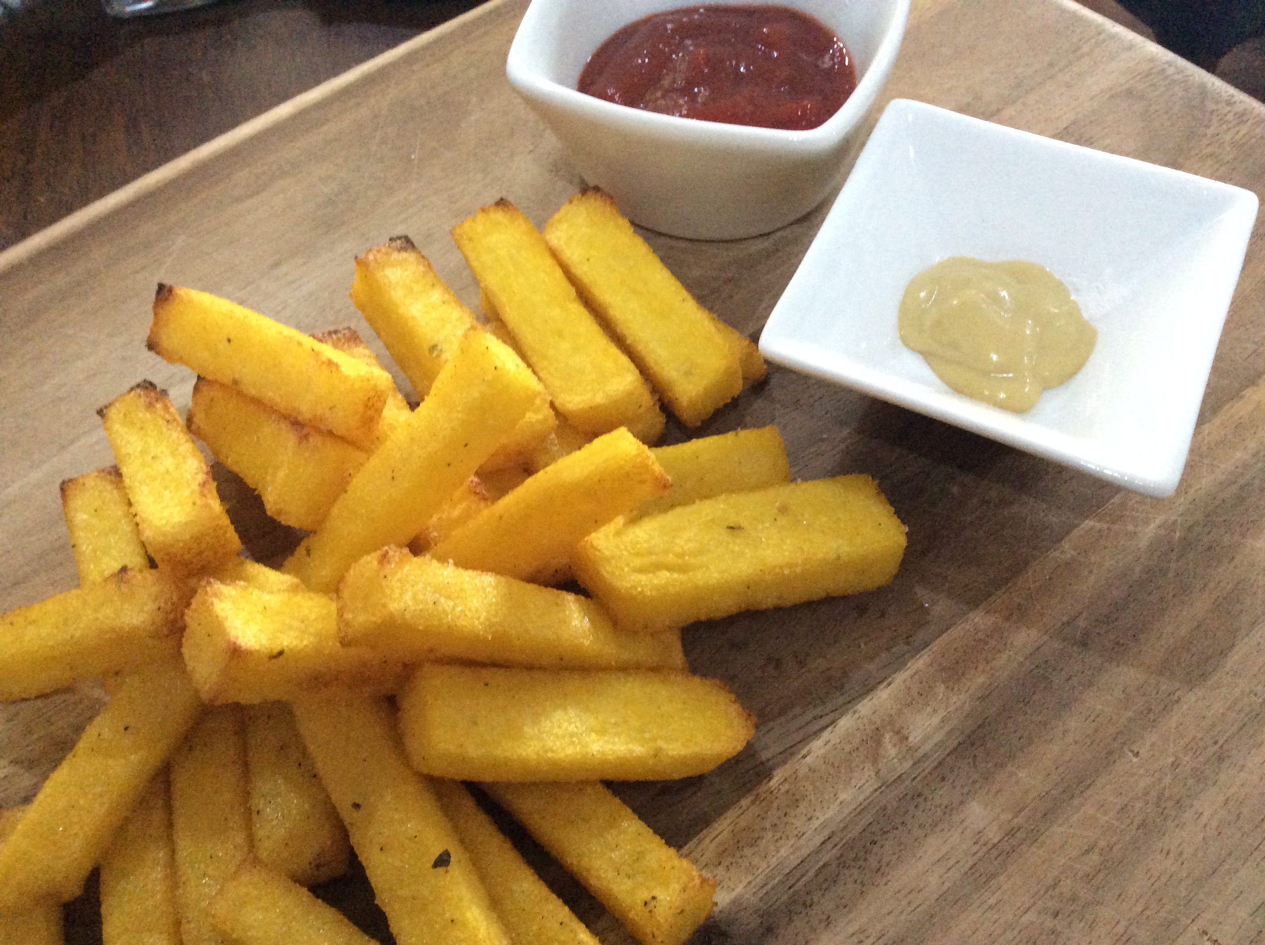 plate of polenta chips and sauce